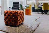Kaboompics - Tufted Brown Square Pouf in Modern Living Room with Contemporary Furniture