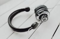 Kaboompics - Wired Headset with Inline Microphone and Audio Plug on White Boards