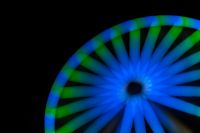 Kaboompics - Blue Ferris Wheel Bokeh with a Green Rim and Copy Space