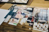 Kaboompics - Designers working with material samples and paper cutouts