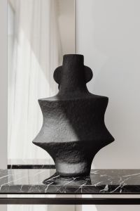 Kaboompics - Close Up Sculptural Black Ceramic Vase On Marble