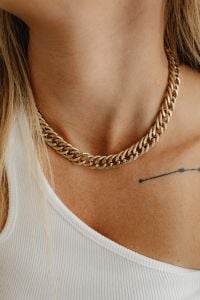 Gold Jewelry Portraits with Chunky Chain Necklaces and Statement Earrings