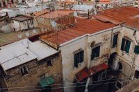 Kaboompics - Close Naples Rooftops With Weathered Facades and Terracotta Tiles