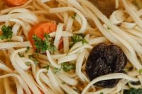 Kaboompics - Macro Chicken Soup with Noodles, Carrots and Dried Mushroom