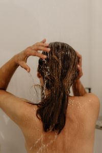 Kaboompics - Woman Rinsing Wet Hair in the Shower