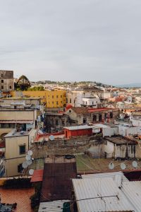 Kaboompics - Vertical Naples City View With Yellow House Among Old Rooftops