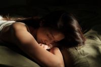 Kaboompics - Woman Sleeping on Her Side in Soft Sunlight