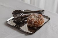 Kaboompics - Glazed Pastry and Metal Tongs on Silver Tray