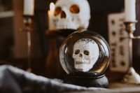 Kaboompics - Close-Up Crystal Skull Ball with Halloween Candles