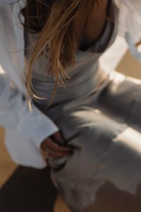 Kaboompics - White Shirt and Satin Skirt Close Up at Golden Hour