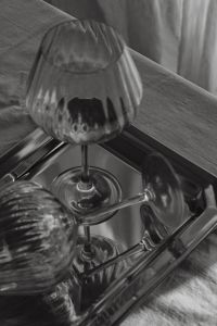 Kaboompics - Glassware Still Life on Reflective Metallic Tray