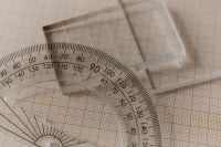 Kaboompics - Overlapping Acrylic Rulers and Circular Protractor