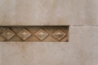 Kaboompics - Decorative Diamond Tile Strip on Stone Wall