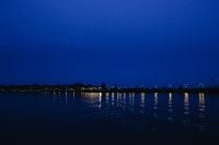 Kaboompics - City lights reflected in the water at night