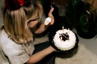 Kaboompics - Overhead Nostalgic Birthday Celebration with Cake and Balloons