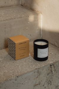 Kaboompics - Black Candle and Fragrance Box on Concrete Ledge
