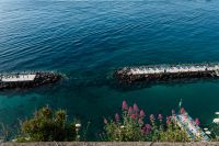 Kaboompics - Aerial View Of Turquoise Sorrento Sea And Flower-Framed Umbrella Piers