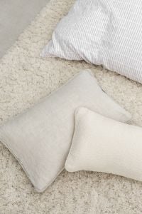 Kaboompics - Neutral Pillows on a Soft Bedroom Rug