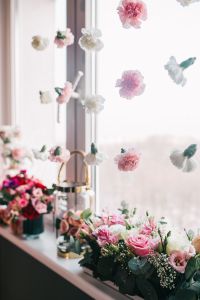 Kaboompics - Airy Flower Installation with Suspended Carnations and Rose Bouquets by a Window