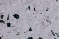 Kaboompics - Cool White Terrazzo with Sparse Dark Green and Gray Stone Inclusions