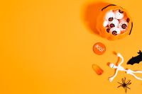 Kaboompics - Halloween Candy Bucket With Skeleton and Spider