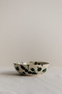 Kaboompics - Green Splatter Bowl Framed by Tall Neutral Copy Space