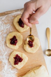 Kaboompics - Filling Polish Paczki Doughnuts with Cherry Jam