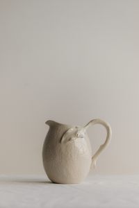 Kaboompics - White Ceramic Pitcher with Generous Neutral Background Space