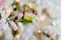 Kaboompics - Soft-Focus Pink Spring Blossoms with Pastel Easter Table Decor in the Background