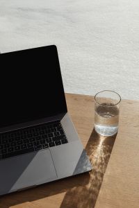 Kaboompics - Minimal Laptop Desk with Textured Wall and Copy Space