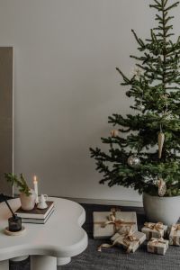 Kaboompics - Christmas Tree and Wrapped Gifts in a Neutral Living Room