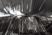 Kaboompics - Abstract Symmetrical Ribbed Chrome Reflections, High-Contrast Silver Metal Texture Background