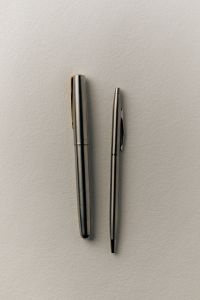 Kaboompics - Two Minimalist Pens on White Background
