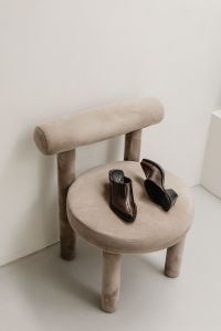 Kaboompics - Brown Leather Shoes on Beige Chair