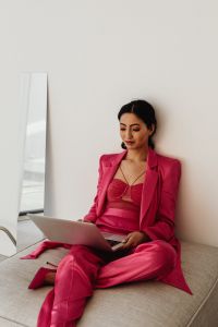 Kaboompics - Asian Businesswoman Seated with Laptop and Copy Space