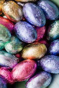 Kaboompics - Vertical Close-Up of Multicolored Foil-Wrapped Eggs