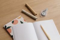 Kaboompics - Lined Notebook and Beige Stationery