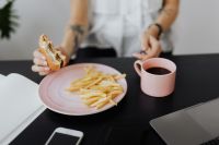 Kaboompics - Freelancer Taking a Meal Break Beside Laptop