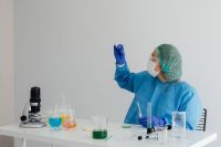 Kaboompics - Medical Researcher Holding a Small Laboratory Sample