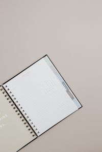 Kaboompics - Spiral Planner Mockup with Beige Background and Copy Space