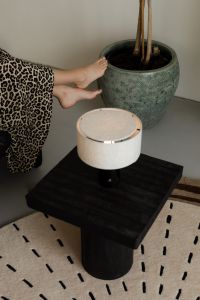 Kaboompics - Barefoot Woman Relaxing Beside Lamp and Large Houseplant