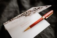Kaboompics - Christmas Card and Envelope with Elegant Red Pen