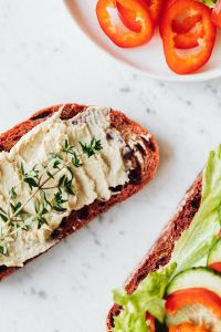 Kaboompics - Hummus Toast with Fresh Thyme and Vegetable Sandwich