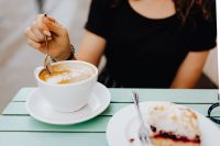 Kaboompics - Drinking coffee and eating cake in a cafeteria