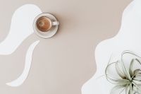 Kaboompics - Top View Espresso Cup on Beige and White Organic-Wave Background with Copy Space