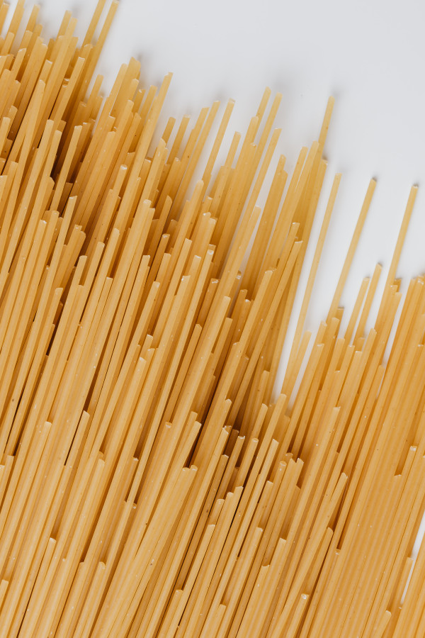 Diagonal Spaghetti Sticks on White for Minimal Italian Recipe Styling ...