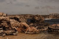 Kaboompics - Rock Shelf, Clear Shallows and Boats Along Malta’s Coast