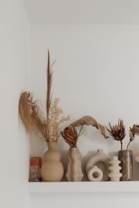 Kaboompics - Decorative Ceramic Vases and Dried Flowers on a Shelf