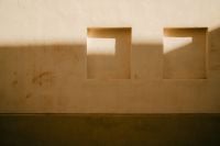 Kaboompics - Minimal Beige Wall with Square Light Recesses