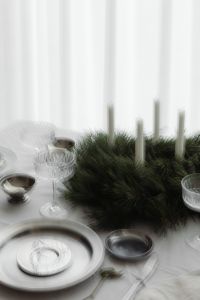 Kaboompics - Motion Blur Close Up Advent Wreath with Lit Candles, Silver Dishes and Glassware